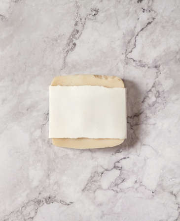 Handmade soap mockup on a white marble backround top viewの写真素材