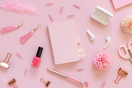 Hardcover notebook and Pink school accessories on pastel pink, top view, textbook mockup. Girly...