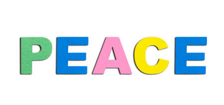 Peace, word written in colorful wooden alphabet letters isolated. The concept of a terrible war destroying country. Top view. Copy spaceの写真素材
