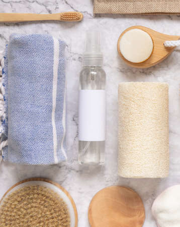 Organic natural cosmetics and zero waste reusable accessories for skin and hair care on marble flat lay. Top view of eco friendly beauty products for bath, massage or spa salonの写真素材