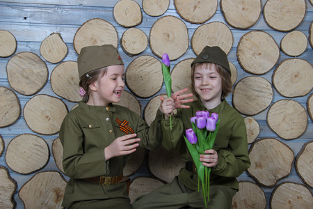 a boy with a girl for the may 9 celebration in Russia of the Victory Day in uniform solemnlyの写真素材