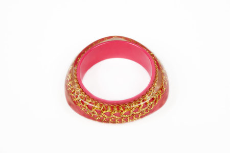 Fashion pink bracelet on a white background  