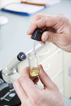 Oil for microscope glasses. Laboratory concept.の写真素材