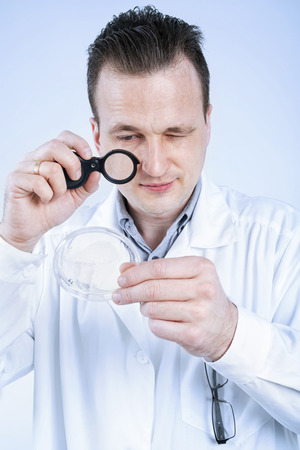 Laboratory assistant studies petriの写真素材