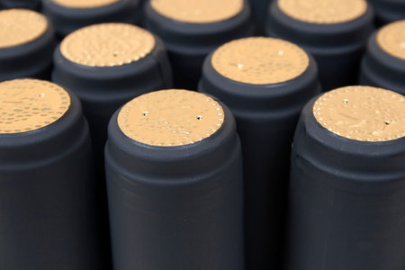 Background from wine bottles. Capsule for wine.