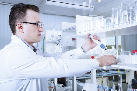 Scientist  works in chemical laboratoryの写真素材