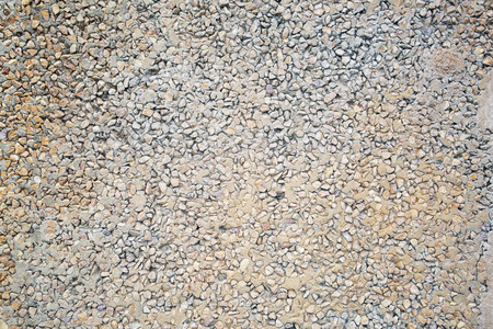 Fragment of old stone pavement surface texture as a background, top view, horizontalの写真素材