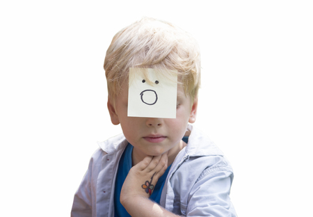On the forehead shows (drawn) gasp icon on yellow stickers. Concept of surprise thoughts and positive emotions. Surprising boy isolated on white background.の写真素材