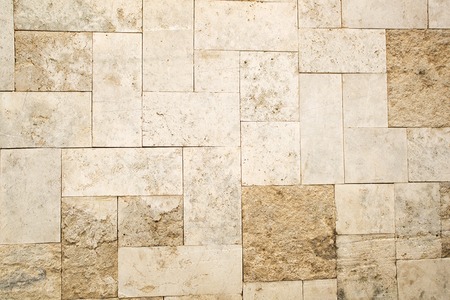 Fragment of beige stone pavement texture surface as a background, top view, horizontalの写真素材