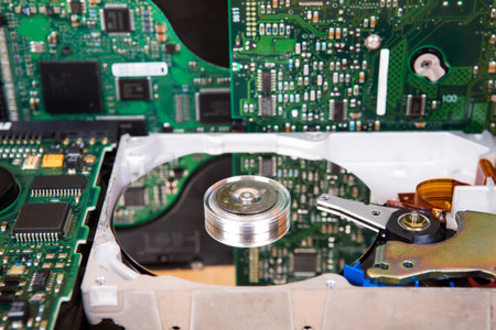 Close-up opened hard disk drive. Hard disk repairing concept, Data saving conceptの写真素材