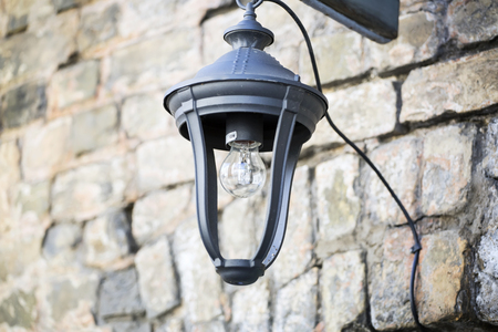 Old small lamp on the street. Europe. Riga.の写真素材