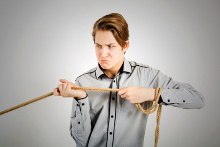 Teenager with a ropeの写真素材