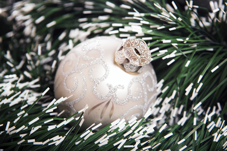 Brilliant  baubles like christmas decoration. Ball on green background.の写真素材