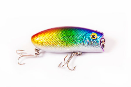 Fishing lure isolated on white. Wobbler in three color. Green, yellow and red colors.