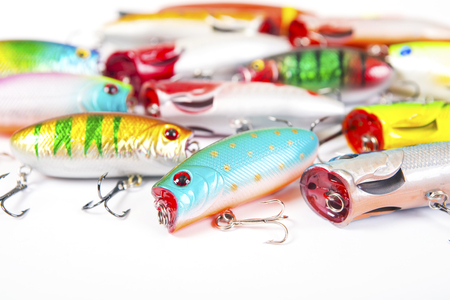 Set of fishing spinners and wobblers multi-colored backgroundの写真素材