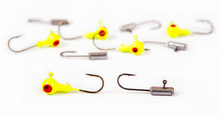 Fishing hooks isolated on white. Metal bait hook