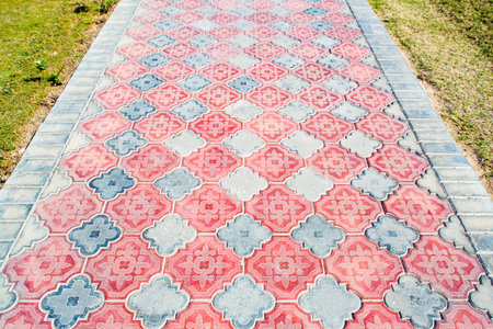 Fragment of old tile and tile pavement surface texture as a background, top view, horizontal.Egypt.の写真素材