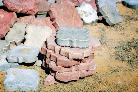 Fragment of old tiles and tile pavement surface texture as a background.の写真素材
