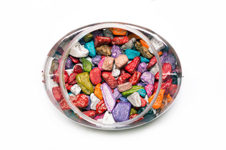 Multi-colored candies.Chocolates stones in a box