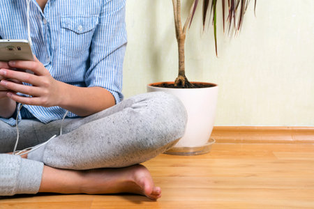 Person with phone in hands. Conversation on the smartphone, modern communications.の写真素材
