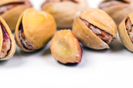 Pistachio nuts. Isolated on a white background.の写真素材