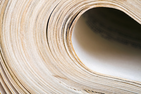 Old book pages, abstract waves as a vintage backgroundの写真素材