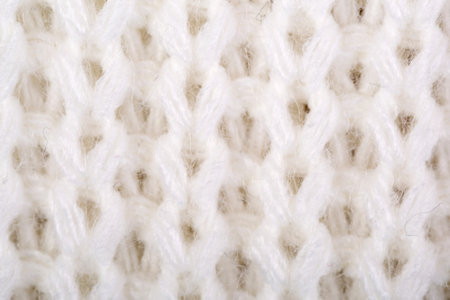 White structure of a  knitted woolen fabric background    