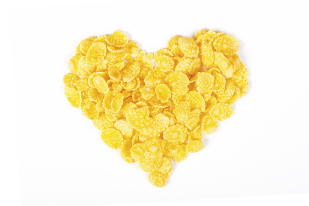Flakes heart from cornflakes for tasty healthy breakfastの写真素材