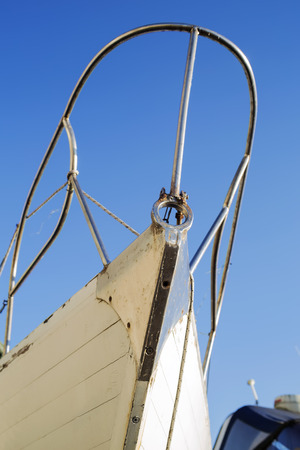 The hull of an old yacht being repaired in a shipyard.の写真素材