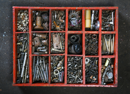 Toolbox . Old wooden Box for metal bolt, nut, crew, nailの写真素材