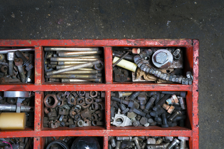 Toolbox . Old wooden Box for metal bolt, nut, crew, nailの写真素材