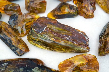 Amber on traditional and natural wayr of a street market on a fair of traditional products, in...