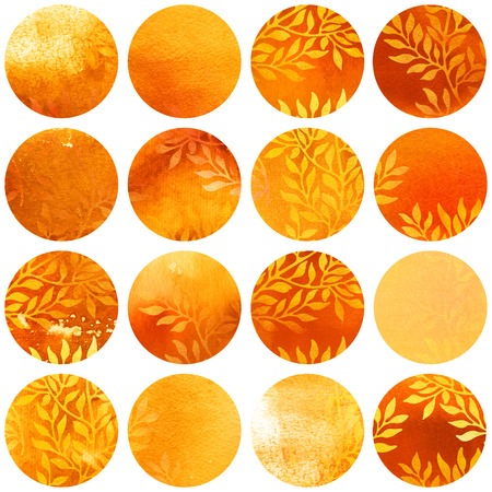 Watercolor autumn circles collection in yellow and orange colors. Watercolor stains set isolated on white background. Watercolour badges with leaves ornament. Seamless floral pattern, wrapping paper.の写真素材