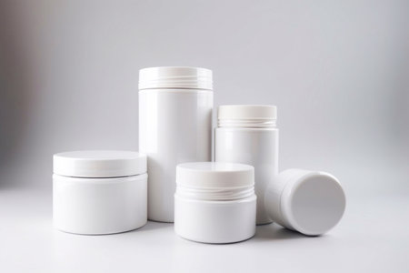 Realistic white cosmetic cream container and tube for cream, ointment, toothpaste, lotion Mock up bottle. Gel, powder, balsam, with empty label. Soap pump. Containers for bulk mixtures.の素材
