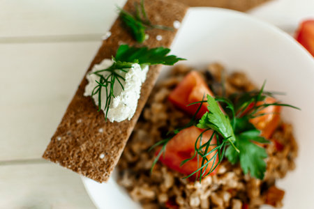 risotto with salmon and cream cheese on a wooden background. tinting. selective focusの写真素材