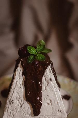Piece of chocolate cake with cherries and mint. Selective focus.の写真素材