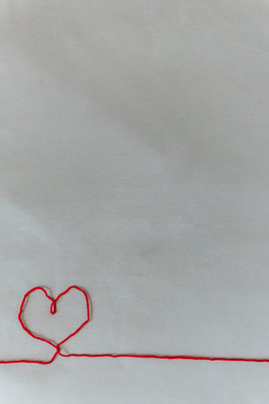 valentine's day. a postcard for the holiday. place for the text. Red heart on a white sheet of paper...