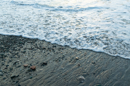 Foam wave. Waves on the beach. Marine background. Seascape. Nature.