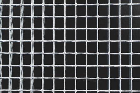 Square lattice. Backgrounds and textures. Metal construction. Details and elements.