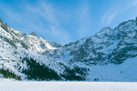 Snowy mountain peaks. Beautiful winter landscape in the mountains. Stone cliffs.の写真素材