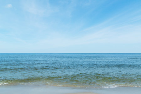 Blue sea and blue sky. Clear sunny day at sea. Simple seascape.