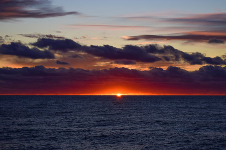 Beautiful sunset over the sea. Seascape. Marine background. Beauty of nature. Wallpaper, postcard.の写真素材