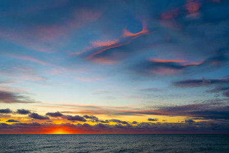 Beautiful sunset over the sea. Seascape. Marine background. Beauty of nature. Wallpaper, postcard.の写真素材