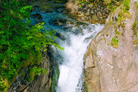 Beautiful waterfall in the Tatra Mountains, Poland. Mickiewicz Falls. Summer landscape in the mountains.の写真素材