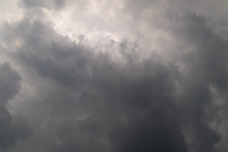 Gray clouds in bad weather. The sky before the rain. Sky background.