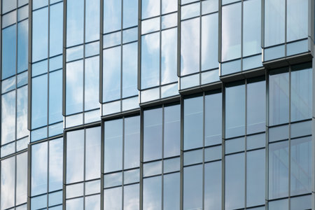 Multi-storey building in the city center. Business center, office. Modern architecture. Details of a modern building. Warsaw.の写真素材