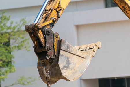 Excavator bucket, close-up. Construction work at a construction site.の写真素材