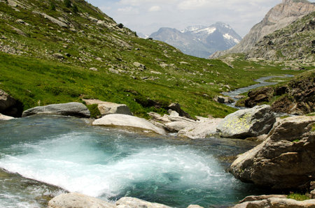 Stream and falls in the mountains, Alps, France
