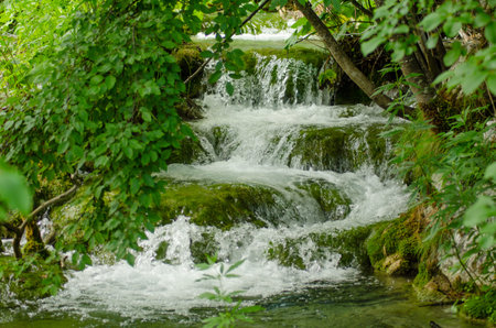 Waterfall as a staircase in Plitvice National Park, Croatiaの写真素材
