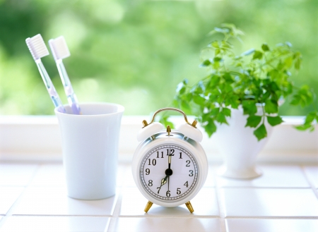 alarm clock and  toothbrushの写真素材